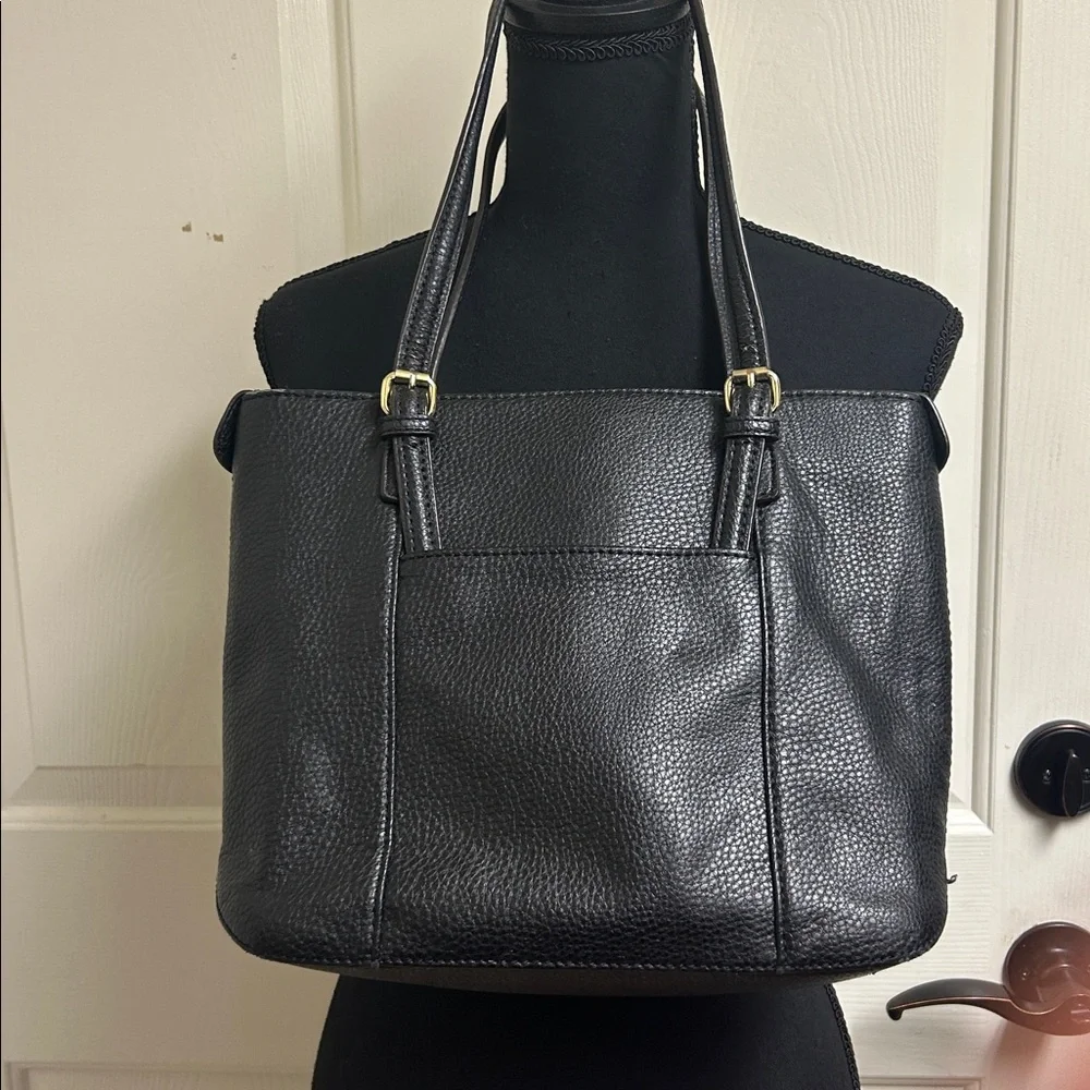 Anne Klein Black leather Tote with size pocket and adjustable straps. 13”x9 1/2”